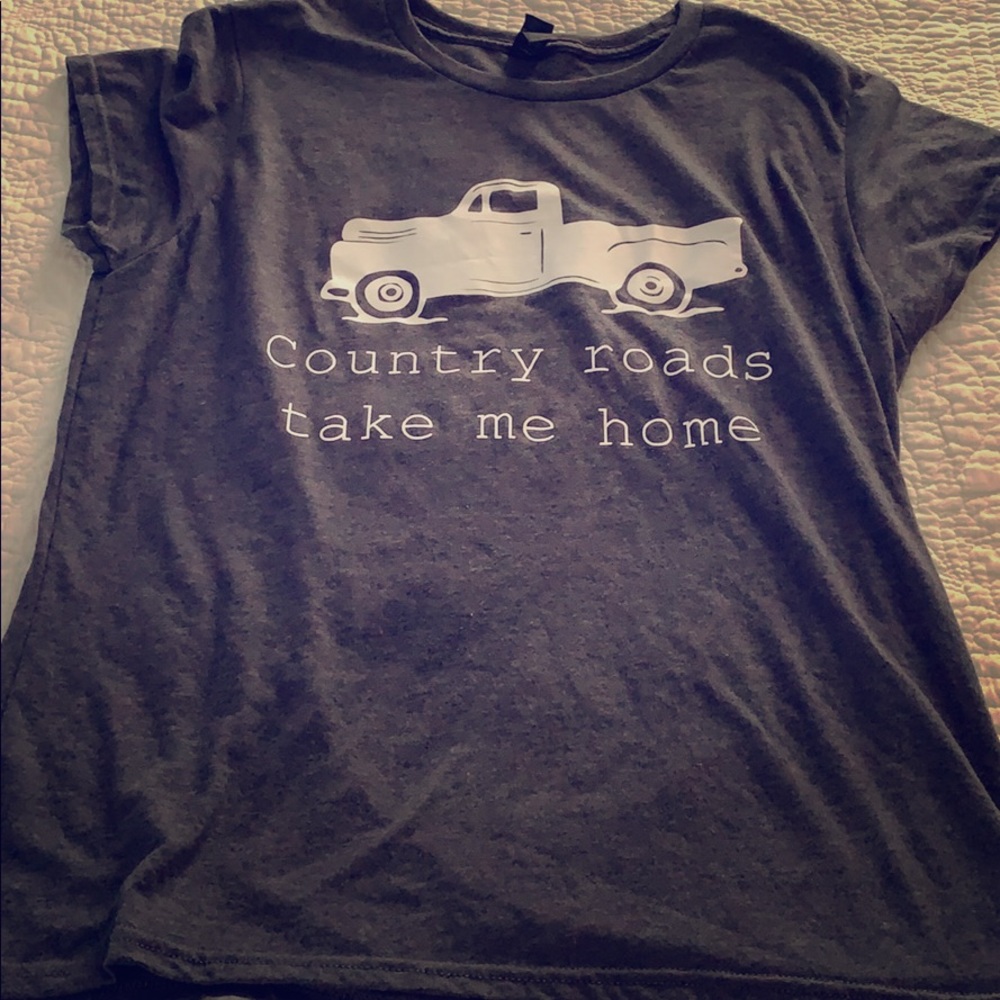 Graphic Tee Size Large fits more like a medium